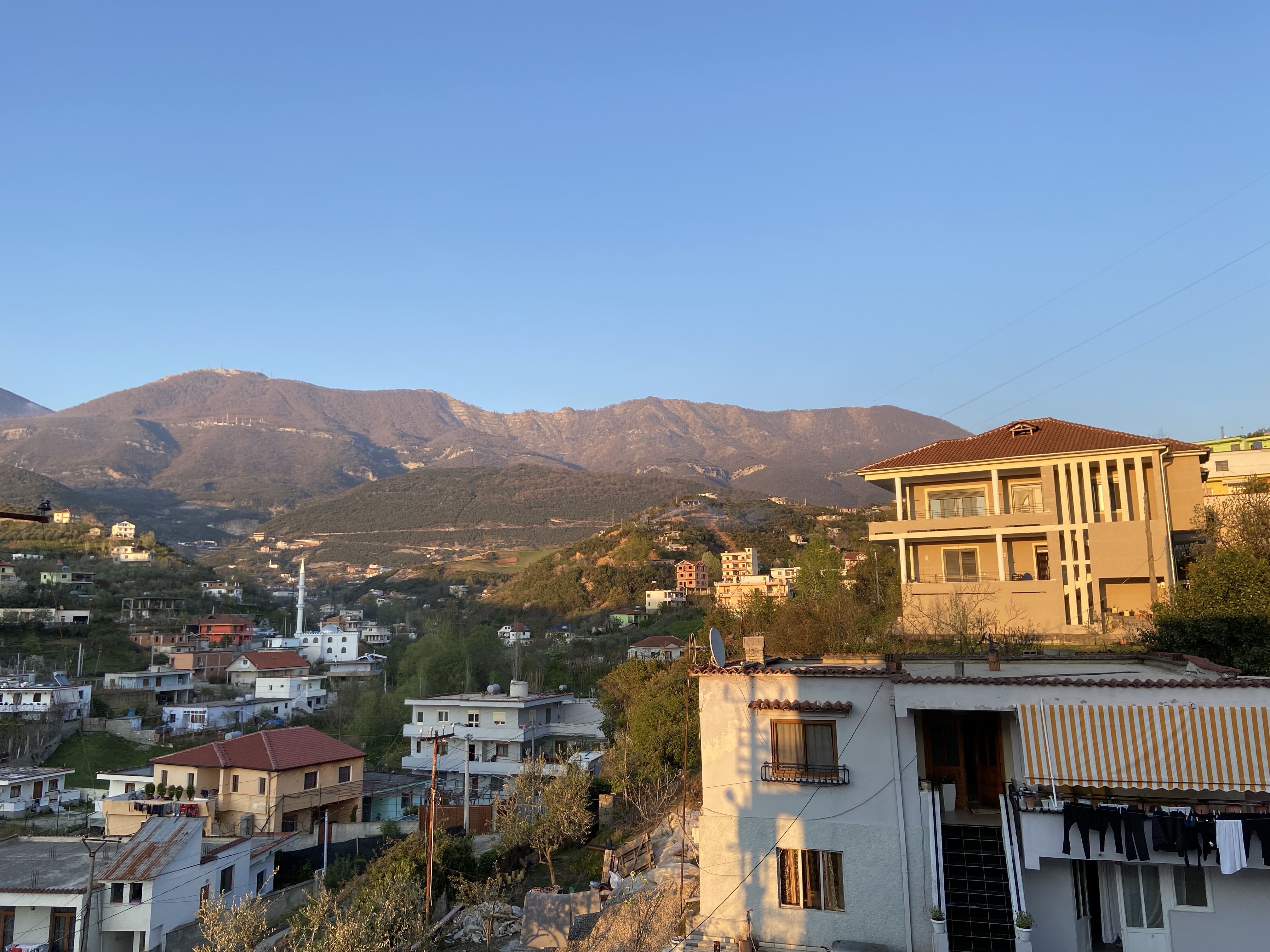 Albanian style houses on the outskirts of Tirana with mountain views looking out towards the countryside. 