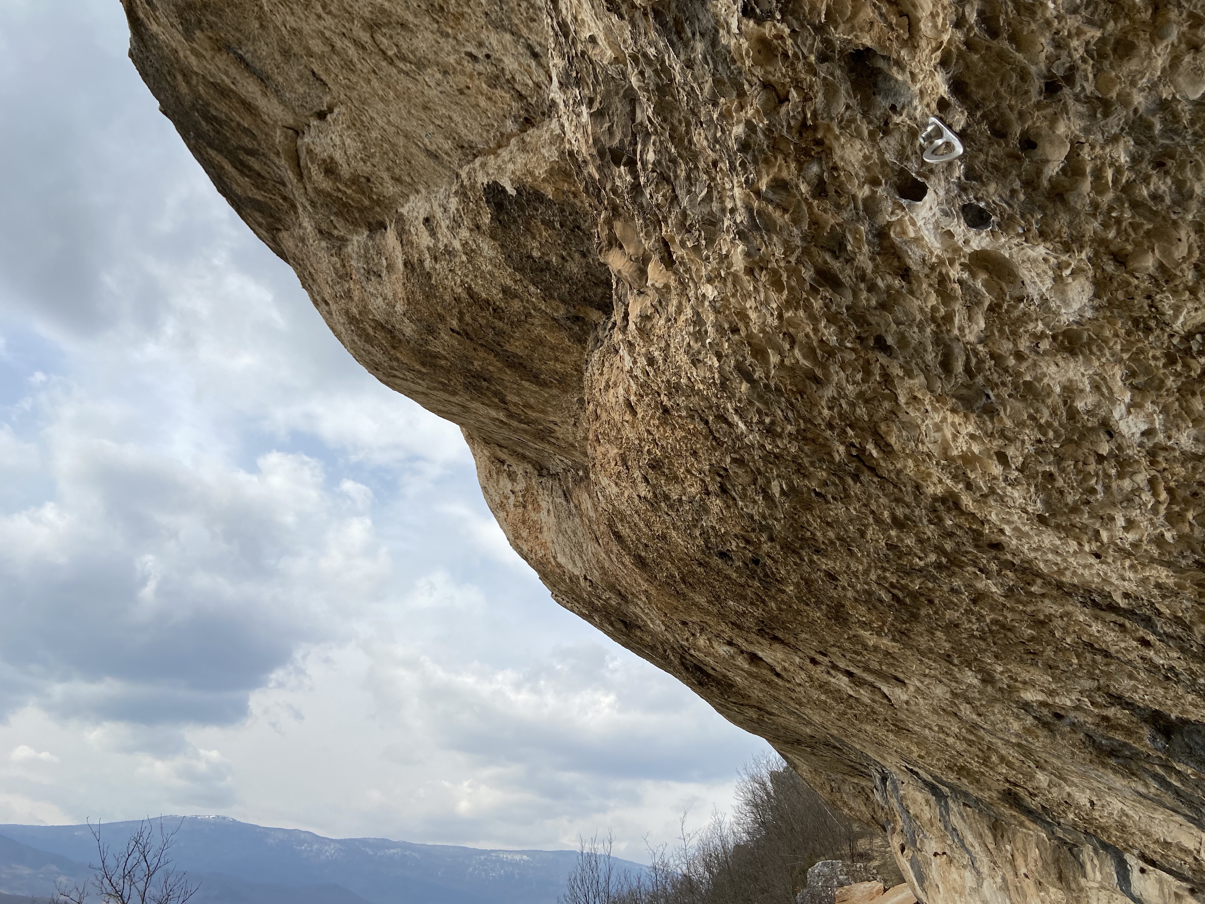 Insanely steep overhanging rock with bolts marking the way of very hard sport routes and projects. 