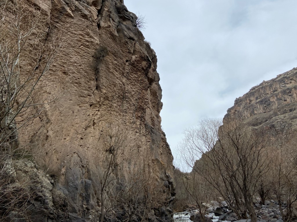 Steep sided gorge with rocky cliffs either side