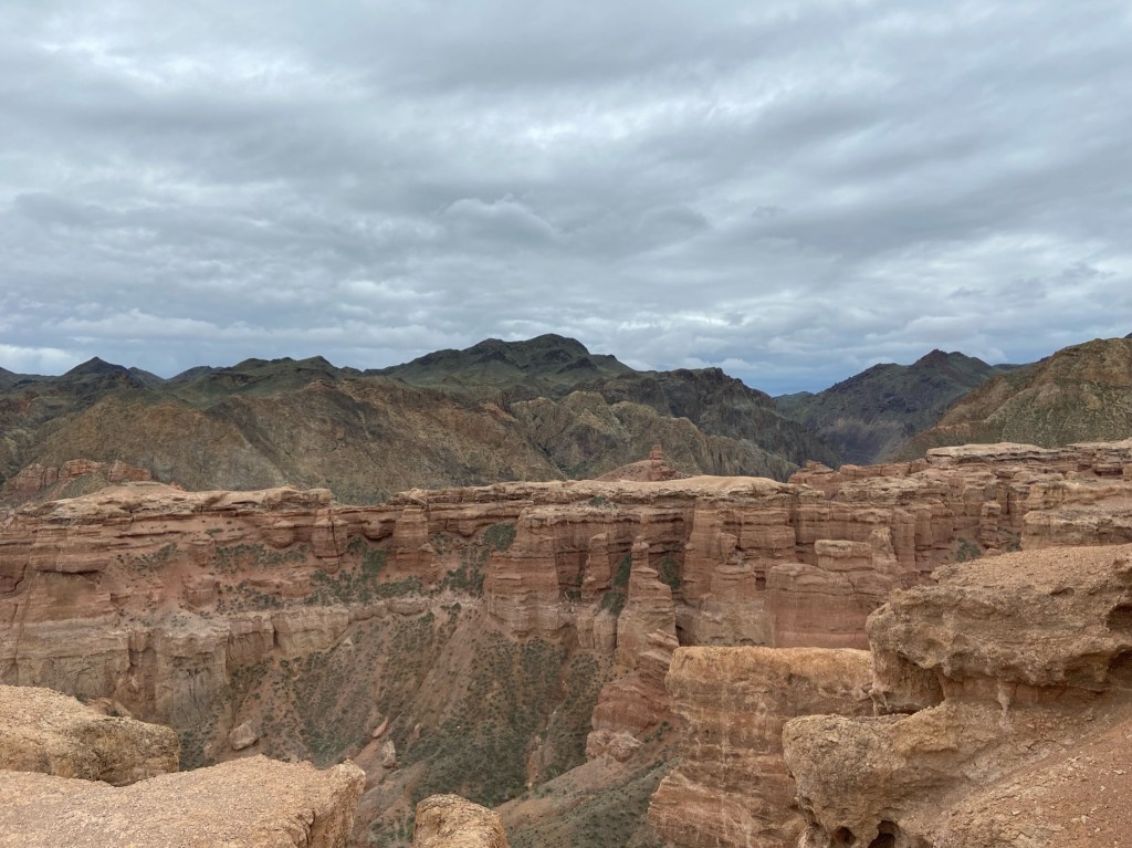 Looking out towards one side of the canyon. There is different pillars of different heights and sizes. On the other side of the valley you can see another more stable rock valley 