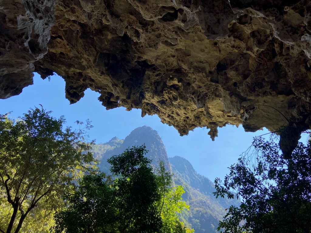 Looking out of the steep cave dripping with tufas on the other side of the valley 