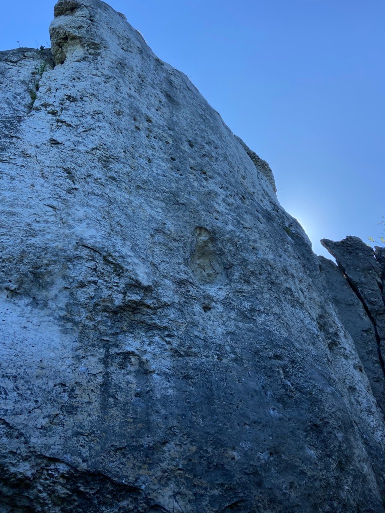 Tall limestone crag with pocketed features